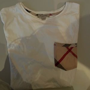 Designer shirt 
Barely worn 
Has one small stain that is shown but is hidden